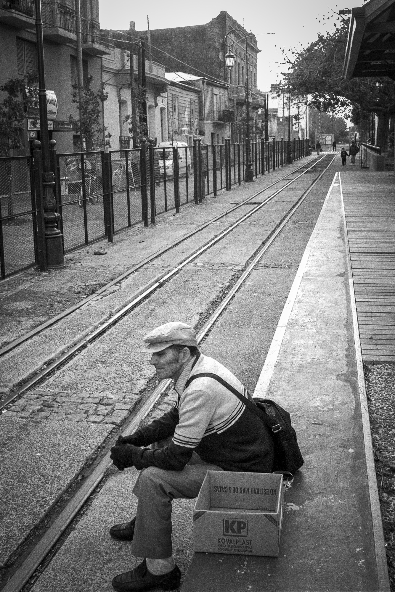 At a tram station by makoto inaba